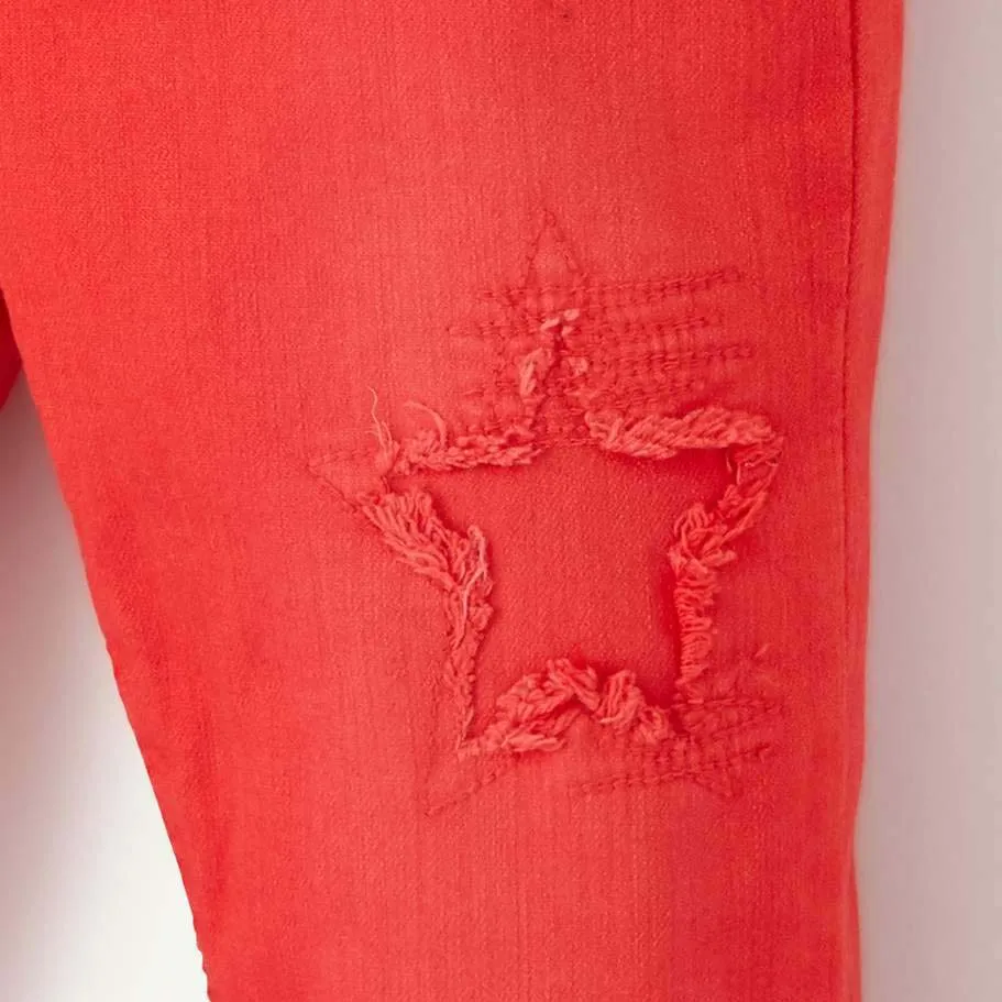 Tape A Loeil- kids' red ' treggings with stars and worn effects  TO878